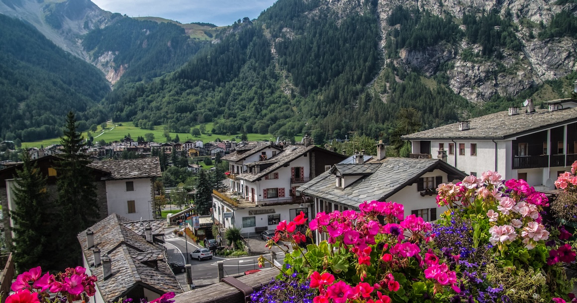 A flower box overlooks charming buildings