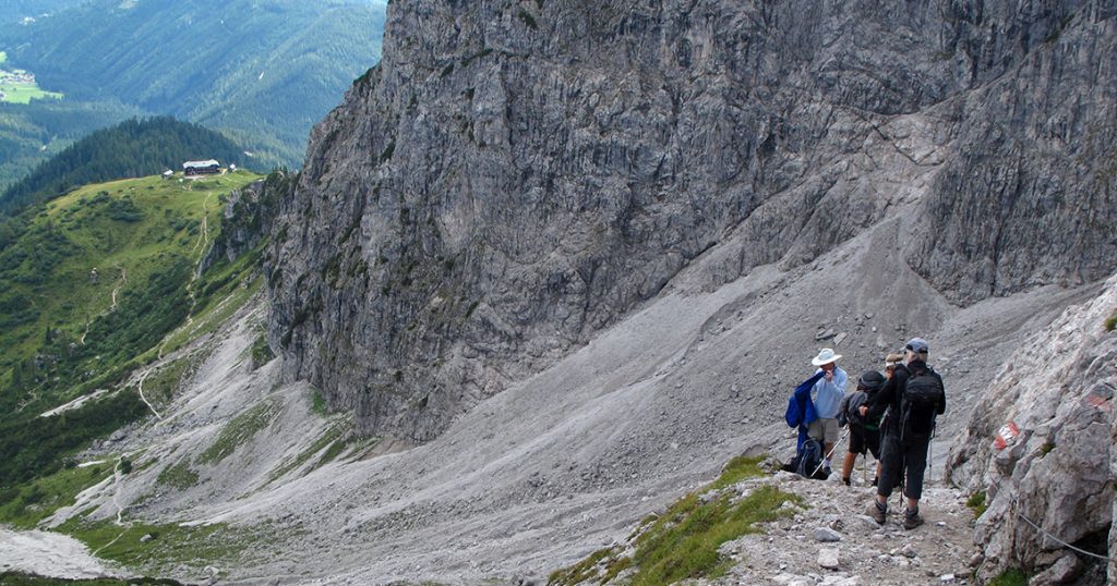 A group of hikers on the trail in the Salzkammergut region of Austria.