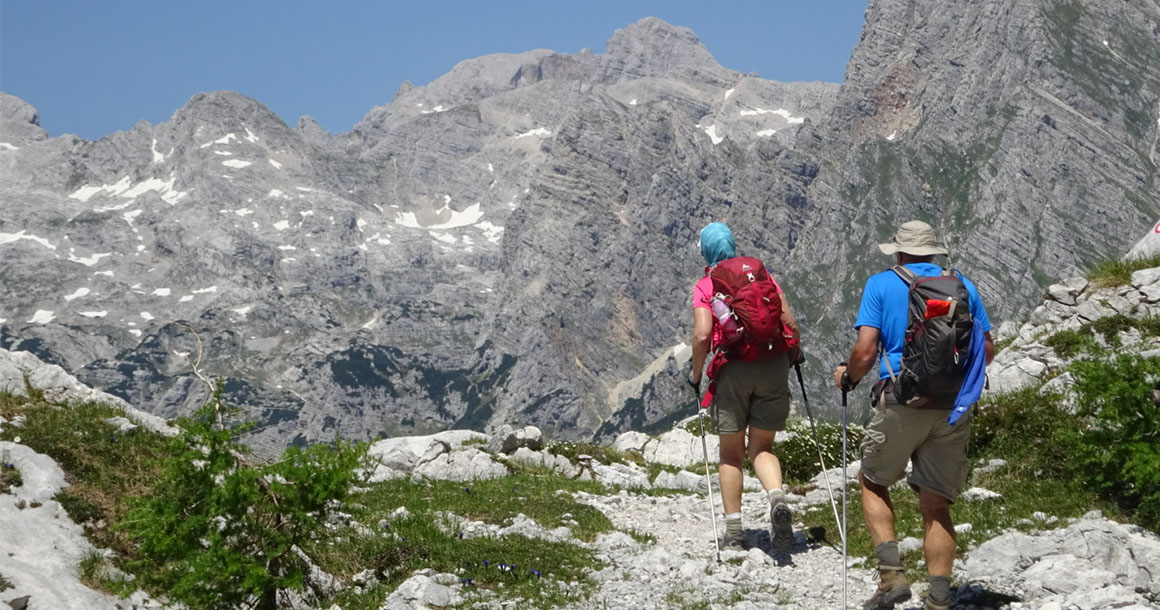 Two people hiking the Julian alps of Slovenia