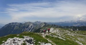 Two people hiking the Julian alps of Slovenia