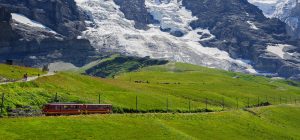 Train and hikers in the Berner Oberland region