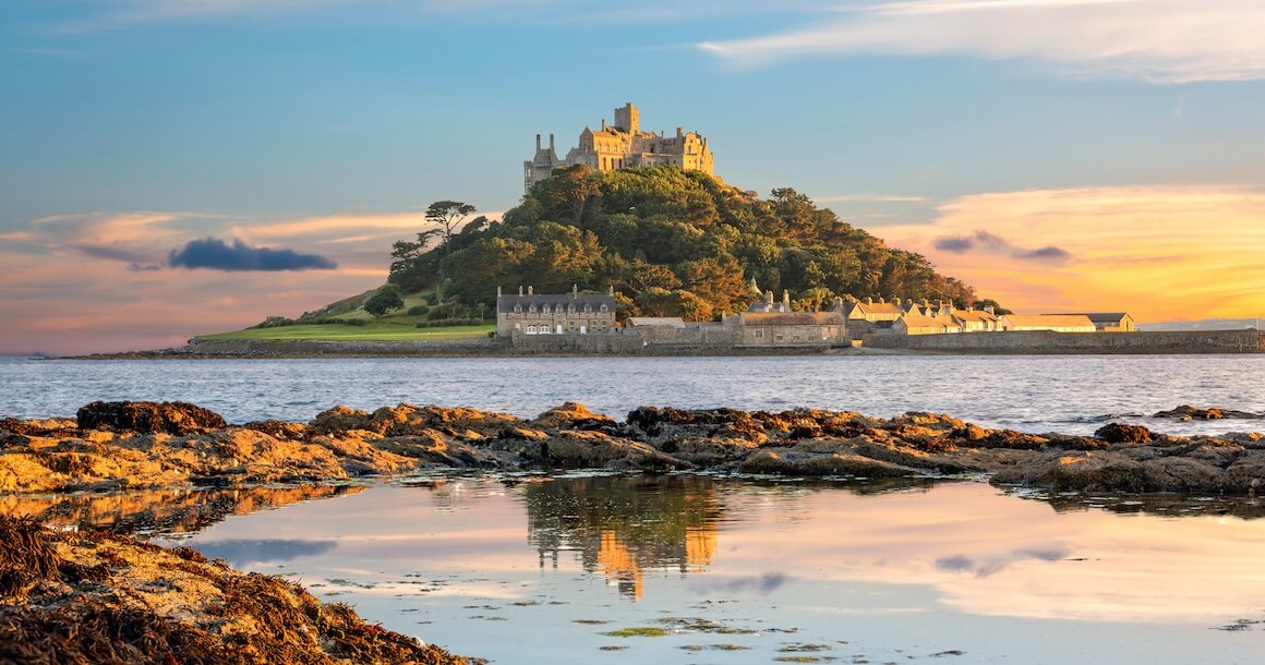 View of St Michael's Mount in Cornwall at sunset.