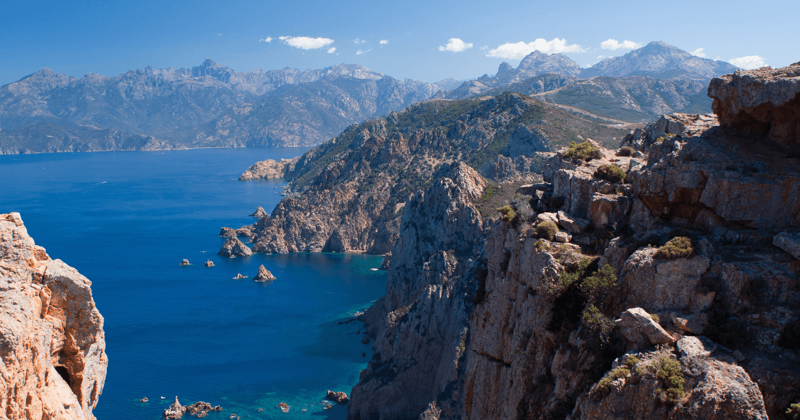 Jagged peaks and hiking trails on the coast of Corsica