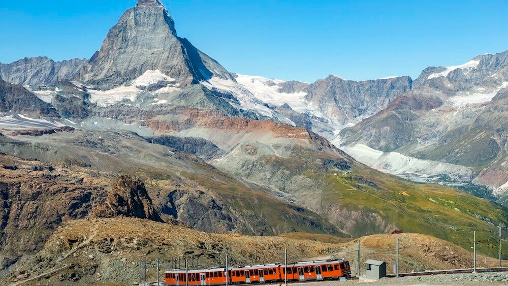 train, Swiss Alps and the top of the Matterhorn