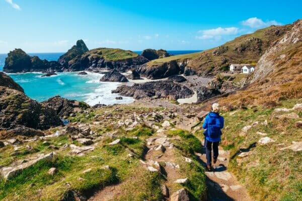 Senior woman walking the coastal path