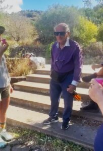 man with bottle of wine